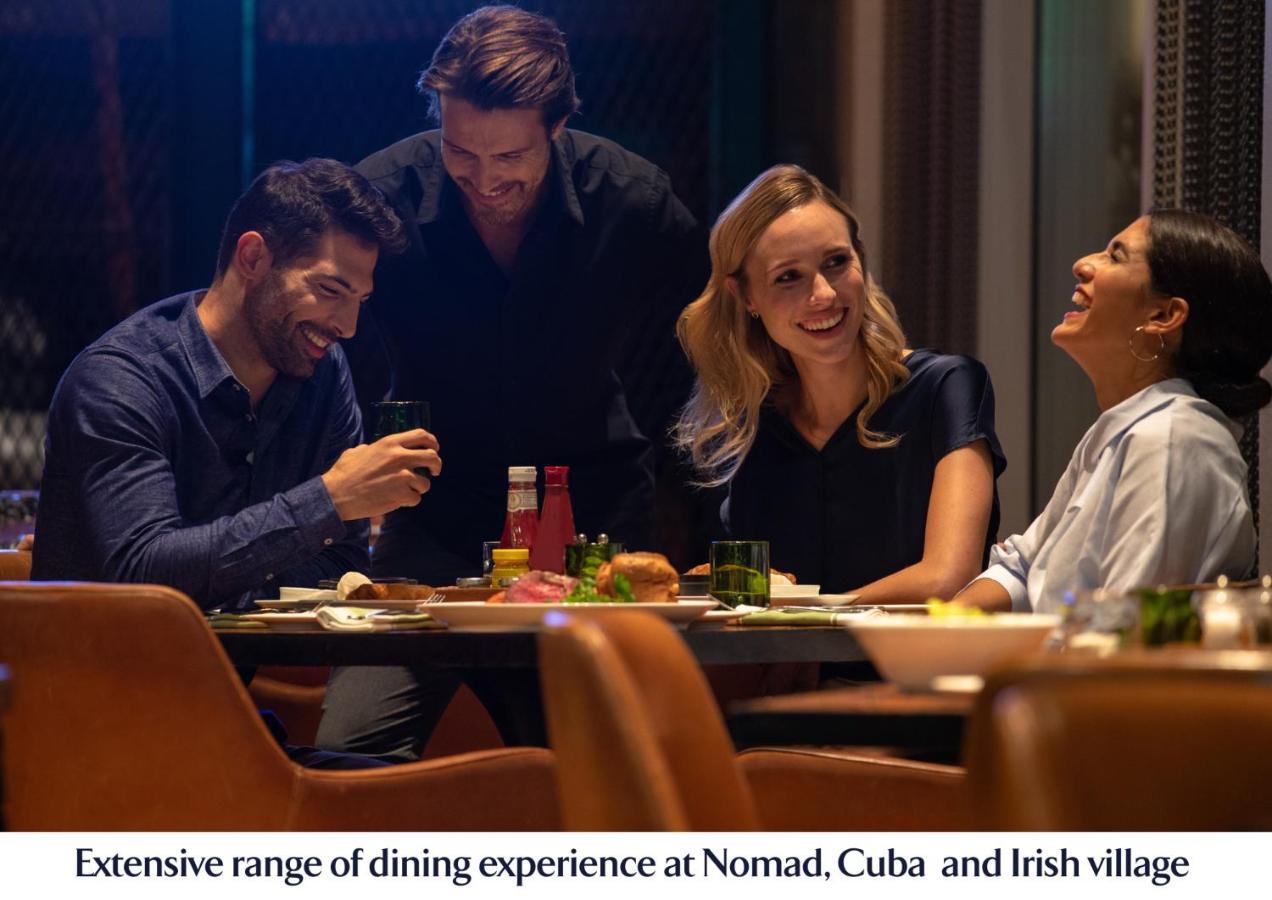 Jumeirah Creekside Dubai Exterior foto Dining at Nomad